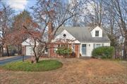 Welcome to this sweet 3-bedroom, 2-bath Cape Cod-style home, perfectly situated on a peaceful cul-de-sac street just minutes from the train station and shopping. This home exudes warmth and character, offering a blend of classic charm and modern conveniences.The main level boasts an inviting living room with a large picture window that floods the space with natural light. A wood-burning fireplace, flanked by two built-in bookshelves, creates a cozy focal point, perfect for relaxing evenings. Beautiful hardwood floors flow throughout much of the home, enhancing its timeless appeal. The eat-in kitchen is a standout, featuring stainless steel appliances, an abundance of cabinets, and plenty of space for casual dining. The first-floor primary bedroom provides convenience and comfort, while the adjacent office offers an ideal space for remote work or quiet study. A sunlit, glass-enclosed breezeway connects the house to the one-car garage, adding a versatile space to enjoy in any season.Upstairs, youâ€™ll find two oversized bedrooms with ample storage, offering the perfect retreat for family or guests. The finished walk-out basement expands the living space with new vinyl wood floors, an exposed brick wall, and a laundry room. This versatile lower level is perfect for a recreation room, home gym, or additional living area, while still providing an abundance of storage space.Outside, the flat backyard invites you to enjoy outdoor activities, gardening, or simply unwinding in a private, peaceful setting. With its quiet cul-de-sac location and proximity to the train and shopping, this home combines tranquility with convenience.This lovingly maintained Cape is filled with charm, light, and thoughtful details, making it the perfect place to call home.