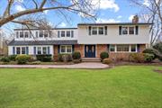 COLD SPRING HARBOR - Welcome to this luxurious 5-bedroom (+ den) 4.5 bath Colonial on half an acre of beautifully manicured grounds within Cold Spring Harbor. With incredible flow, and remarkable floor plan, it emits elegance and glamour throughout, with 2 fireplaces, vaulted ceilings and skylights, sunroom, and great spaces for entertaining - the newly renovated chefs kitchen is a culinary dream, featuring duel fuel Viking Range with Venatahood, Viking microwave drawer, Thermador refrigerator, Kitchen Air dishwasher, quartz countertops, and a black walnut butcher block center island. The formal living room with fireplace and dining room, den with fireplace and sunroom, office/bedroom, complete the first floor. Primary suite, large walk in closet, 3 additional bedrooms and 2 additional full bathrooms complete the 2nd floor. Lower level completes the home with full bath, laundry, utilities, and more. A must see!