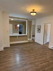 Multifamily Lower Unit Rental Featuring, Open Floor Plan, Living Room, Kitchen with Peninsula& Stainless Appliances, Living Room, Hardwood Floors Throughout, 2 Bedroom, 1 Bath, In-Unit Laundry. Separate Utilities. Parking Provided.