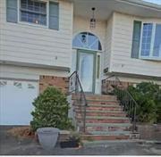 High ranch with 3 Bedrooms & 2 Full Bathroom in Oceanside.