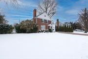 This charming mid block brick Colonial sits on a lush 75x146 property. The side-hall layout offers an inviting open flow, featuring a formal living room with a wood-burning fireplace, a formal dining room with an open entry to a renovated kitchen complete with a peninsula island and stainless steel appliances. The first floor also includes a cozy side den, a powder room, and a bonus room. Upstairs, you&rsquo;ll find three spacious bedrooms with ample closet space and a beautifully updated full hall bathroom. The fully finished basement boasts a convenient walk-out egress, a separate area with high ceilings for gym equipment. There is a large driveway that can easily accommodate 4 cars. Ideally located walking distance to shopping, the village, major highways, LIRR and other amenities.