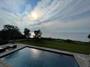 This spectacular bluff-top home overlooking the Long Island Sound was designed for seamless indoor/outdoor living. As you enter the residence, you are instantly awestruck by the stunning floor-to-ceiling coastline views. From the spacious living room, step out to a large deck to better enjoy the expansive yard, which boasts a large pool, BBQ area for alfresco dining and a fire pit for unforgettable sunsets across the Sound. The home features three large bedrooms: one primary suite with a king bed, a second primary suite with a queen bed and a bunk room with 4 twin beds. Each bedroom is ensuite with its own bathroom and the two primary suites are both ocean facing with a private deck to enjoy a more intimate view. In addition, you will enjoy a gourmet kitchen, family room, separate office, formal dining room, playroom, two laundry rooms and finished bonus space in the basement.  This gorgeous home is nestled in a quiet cul-de-sac in one of the North Fork&rsquo;s most coveted locations - convenient to the shops of Love Lane, dining, and beaches. Relax and enjoy the embodiment of North Fork coastal living at its finest!  SRP#0757, Additional information: Appearance:excellent