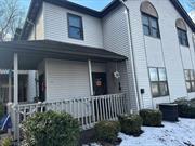 This very commuter friendly condo close to NYs thruway Come visit this ground floor end unit condo walk into this very spacious living room and formal dining area. The kitchen also is very spacious with sliding glass door overlooking a walk out patio backing into the privacy of the woods. There are two nice size bedrooms with a walk-in closet. the unit also has two full bathrooms .and a utility room with the convenience of a wash and dryer .