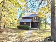 Escape to this peaceful 2 bedroom, 2 bath country retreat, nestled on 10 acres with direct access to the Wallkill River. Set back off the road, this rental offers privacy and tranquility in a natural setting. Inside, the open floor plan is bathed in light from skylights, creating a bright and airy atmosphere. The living room opens onto a spacious deck, perfect for entertaining or taking in the views. The first floor features a bedroom and full bath for convenience, while upstairs, the primary bedroom offers an ensuite bath and a balcony. Hardwood flooring and many upgrades throughout the house. Washer and dryer included. Venture down to the river or explore the property&rsquo;s expansive acreage. Whether you&rsquo;re looking to unwind in nature or simply to enjoy the comforts of a beautiful home, this retreat offers the best of both worlds.