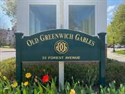 This sunny Old Greenwich Gables condo features 2 bedrooms with multiple closets, 2 fully renovated baths, an updated kitchen, and a spacious living/dining room with wood burning fireplace that opens out to the patio. Recently painted, hardwood floors throughout. Garage with assigned parking space with additional guest parking spaces outside. Storage unit included. Enjoy the pool and new recreation room, fitness room, and squash court. Set in a great location within this desirable complex convenient to Old Greenwich shops, restaurants, schools, the beach, and the train.