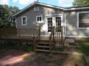 Secluded 2BR/2BA RANCH w/2 large decks, all wood floors and wood siding + detached 2 car garage on 7 acres in Hamlet zone, easy subdivison for separate 3 acre lot. Adjoining 8 acre and 4 acre lots available. Develop a family compound or subdivision for sale.Great location between Pine Plains Village and Millerton on quiet road off Route 199. New well installed. Back on market after buyer couldn&rsquo;t qualify for mortgage. Easy to show unoccupied.