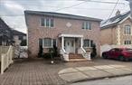 Large center hall colonial on a 50x100 lot with a 2 car detached garage in yard. Walk into a large riving room, dining room and a large den & full bath. There is also an updated kitchen off the back of the house with sliders to the yard. Top floor features 3 VERY Large bedrooms, 19x12, 13.7x14.9 & 15.8x15.9, and a full bath. The basement is full and finished with a full bath. This is a very large home that you can make your own!