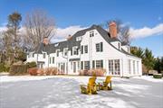 SYOSSET. Take a look at a beautifully modernized piece of history within this Colonial Revival-styled home, dating back to the 1900s. A country setting nestled privately on about 1.5 acres of flat, landscaped land with additional charming cottage. A circular drive welcomes you to this grand center-hall Colonial showcasing unmatched architectural style â€“ blending classic interior ambiance with modern comfort and updated amenities, while holding true to original character; distinctive interlocking gable-hip roof, casement wood-framed multi-paned windows, elegant Victorian-style doors & French doors throughout, sun rooms and solariums providing inviting spaces to relax and enjoy natural light, while high ceilings, high baseboard moldings, incredible hardware, and intricate details enrich every corner. With three levels, (not including lower level with outside entrance, laundry, storage/utilities), featuring 5 bedrooms, and 4.5 bathrooms, formal living room with wood-burning fireplace (reclaimed redwood wall paneling) and 2 sets of French doors that open to a romantic solarium, a formal dining room with fireplace and access into another solarium/den, a large chefs kitchen with breakfast room separated by a Thermador gas range oven with Broan hood vent, spacious mud room, 2 staircases leading upstairs to 2nd and 3rd floors, which accommodates primary bedroom suite with fireplace and large closets, along with three additional bedrooms + office and two full baths that complete this level. Third floor holds sitting room, full bath and bedroom with additional attic space. Additional facts and features: new roof (2023), freshly painted exterior, and more!