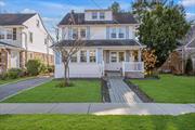 Welcome to a charming and bright colonial home set on a lovely block in the heart of Malverne. First floor features an open layout with a patio entryway, spacious living room with a fireplace, formal dining room, large eat in kitchen with stainless steel appliances and quartz countertops an updated powder room and door leading to an enormous backyard with a one car garage, above ground pool and gazebo. Upstairs, discover three spacious bedrooms, all with ample closet space along with a gorgeous bathroom featuring a double vanity and beautiful tiles. Third level leads you to a full unfinished attic - perfect for storage. The lower level offers an empty palette basement which can be transformed into a desired space, with an existing laundry room and mechanicals. This home is perfect for the entertainer. It truly is one of a kind!