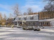 Located in Garrison, NY, this country carriage-style house was once part of the estate of Samuel Sloan, a prominent railroad magnate who settled in the Hudson Valley during the 1850s.Charming and filled with natural light, the home has been meticulously renovated from top to bottom, seamlessly blending comfort, style, and functionality.The gardens, thoughtfully designed by the owner, offer year-round beauty and tranquility while remaining easy to care for. Graceful stone walls wind through the property, encircling orchards along with vegetable and flower gardens, creating a serene and picturesque landscape.Another standout feature of this property is the endless pool and sauna, which provide the perfect spaces for relaxation and recreation in every season.Ideally located just minutes from Metro-North, the historic Village of Cold Spring, and the stunning Hudson River, this home is perfect for use as either a full-time residence or a weekend retreat. It truly offers everything one could desire.