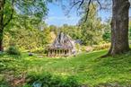 Located in Garrison, NY, this country carriage-style house was once part of the estate of Samuel Sloan, a prominent railroad magnate who settled in the Hudson Valley during the 1850s.Charming and filled with natural light, the home has been meticulously renovated from top to bottom, seamlessly blending comfort, style, and functionality.The gardens, thoughtfully designed by the owner, offer year-round beauty and tranquility while remaining easy to care for. Graceful stone walls wind through the property, encircling orchards along with vegetable and flower gardens, creating a serene and picturesque landscape.Another standout feature of this property is the endless pool and sauna, which provide the perfect spaces for relaxation and recreation in every season.Ideally located just minutes from Metro-North, the historic Village of Cold Spring, and the stunning Hudson River, this home is perfect for use as either a full-time residence or a weekend retreat. It truly offers everything one could desire.
