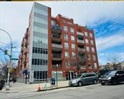 Discover this Inviting 2 Bedrooms, 2 Full Baths Elevator Condominium. South Exposure, 704 SQFT, Bright with Balcony (64 SQFT). The Apartment Features Stainless Steel Appliances including Dishwasher, Washer & Dryer & Split A/C in the Unit. Conveniently Located at the Heart of Flushing (Roosevelt and Parson Blvd). Maintained Well with Care and Love. Low Common Charges, Monthly Assessment $320.92 to 12/31/2025. Near Buses, Shops, Steps to Main Street for No.7 train, LIRR & much more. Seeing is Believing!