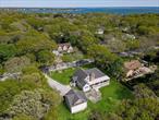 Charming, Well-Built Post-Modern Just Minutes from a Private Bay Beach â€“ Move in for Summer and Experience the Hamptons Like Never Before!Nestled in the heart of Tiana Shores, one of East Quogueâ€™s most sought-after waterfront communities, this furnished and well-built post-modern retreat offers 3 bedrooms, 2.5 bathrooms, and the perfect Hamptons summer escape!A quaint, private driveway leads to a charming side portico entrance, welcoming you into a mudroom with pantry that seamlessly connects to the open-concept kitchen, dining area, and den/home officeâ€”an inviting space perfect for entertaining and relaxation.The spacious living room boasts a gas fireplace, flanked by two sets of French doors that open onto a covered mahogany deck, ideal for al fresco dining and summer gatherings.The main level features a private primary ensuite bedroom with French doors leading to the deck, an adjacent junior ensuite, and a convenient laundry room. Upstairs, a loft-style guest bedroom offers its own private bath, providing additional comfort for visitors.Step outside to a large, private fenced-in yard, complete with a patio, fire pit, and volleyball area, creating the ultimate summer oasis. A detached two-car garage with a guest loft and fitness space adds even more versatility to this exceptional property.Located just minutes from a private community bay beach, youâ€™ll enjoy easy and exclusive access to the bay, with the option to join the prestigious Tiana Beach Club for an unparalleled summer experience.Beyond its prime location, this home is just moments from world-renowned Hamptons ocean beaches, the Jitney, top-rated restaurants, and the vibrant Westhampton Beach Main Street shopping district.Donâ€™t miss this rare opportunity to rent in one of the Hamptons&rsquo; most desirable waterfront communities this summer!