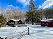 Nestled along a peaceful stream, this charming 2-bedroom home offers the perfect blend of serenity and adventure. Currently a thriving Airbnb, this retreat presents a turnkey investment or a cozy haven to make your own. Ideally situated between three premier ski resorts, the property provides year-round appeal, from world-class skiing and snowboarding in the winter to hiking and mountain biking in the summer. The area is a sought-after vacation destination, boasting renowned spas, top-rated restaurants, and craft breweries just minutes away. A versatile shed offers additional potentialâ€”whether you envision a private studio, workshop, or extra storage for your outdoor sporting equipment. . Whether youâ€™re looking for a lucrative rental or a tranquil escape, this streamside gem is an opportunity not to be missed. Second home in progress also available. A great way to increase your portfolio.