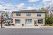 Mixed Use building containing 4, 500 square feet commercial space on the ground floor which includes an Existing Auto Body Shop and Beauty Supply Store on the ground floor with multiple working areas and office space. The second floor consists of two one-bedroom updated apartments with lots of sunlight throughout, approximately, 1, 630 +/- square feet of residential space on the second floor. Additional parking room/lot for the autobody part of the building. Contact agents for more information.