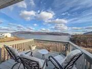 Luxury Living with Breathtaking Hudson River Views!Experience unparalleled elegance in this exquisite 3-level home boasting 3, 100 sq. ft. of meticulously designed living space. Offering 3 spacious bedrooms and 3.5 luxurious baths, every corner of this home invites comfort and style.Step out onto one of the multiple decks, each with sliding glass doors and walls of glass that provide stunning panoramic views of the majestic Hudson River, the iconic Bannerman Castle, and endless mountain vistas. Watch sunrises that will leave you speechless every morning â€” this is a truly one-of-a-kind location!The expansive main level is ideal for both relaxation and entertaining, featuring a chefâ€™s kitchen with gleaming granite countertops and top-of-the-line appliances. The open-concept design provides ample space for hosting family and friends in a light-filled environment.The private master suite is a true retreat, with a spa-like bathroom, walk-in closet, and direct access to your personal deck, where you can savor the beauty of the horizon with your morning coffee. A second bedroom suite offers its own private bath and steam shower, ensuring comfort and privacy for guests.The lower level offers versatile space perfect for an in-law suite or entertainment area, with sliding glass doors leading out to beautifully landscaped grounds and more breathtaking views.An oversized garage provides abundant storage space, and the home is part of a vibrant community with exceptional amenities, including a fitness center, pool, tennis, and pickleball courts.Ideally located in one of the Hudson Valley&rsquo;s most coveted commuter locations, this home is just minutes from the Ferry to Beacon Train, waterfront dining, Cornwall Hospital, and a myriad of local attractions.This rare gem is waiting for you â€” donâ€™t miss out on the opportunity to call this luxurious, view-filled oasis your own!