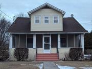 This solidly built home in the Village of Otisville, has been lived in, loved and enjoyed for over 60 years! A large screened in front porch welcomes you to sit, relax and enjoy the peaceful surroundings of the village. The beveled glass front door opens into a spacious living room with abundant windows. The living room flows into the dining room which is open to the kitchen. The island kitchen invites you to sit and watch the birds at the bird feeder through the corner windows above the kitchen sink. There is a 1/2 bath on the first floor, along with a foyer and two large closets for extra storage. The second floor features a primary bedroom with sitting area, two addtional bedrooms and a full bath with tub/shower. Off the kitchen is a mud room leading to an updated large back deck, flat yard, car port, paved driveway and a 2 car detached garage with second floor storage. Convenient to major highways, shopping, public transportation and area parks. Minisink Valley Schools.