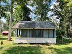 Incredible tiny house. River front house suitable for living. Country cottage on the neversink river. Relax on your screened in the front porch and watch as the ripples go by. As the sun heats up, go and cool off in the invigorating swimming hole as the rest of the family mingles at the river edge by the campfire. 2 small bedrooms, hardwood floors, original stone fireplace, walk up attic, corner lot with additional lot that can be developed for another house. Come fish, swim and enjoy the sounds of the river from your private riverside retreat.Donâ€™t miss the opportunity!