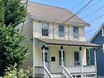 Welcome to this charming 2nd floor apartment in the heart of downtown Nyack. Enter from the front porch into the spacious foyer. From there, itâ€™s one flight up to the apartment which features wide-plank hardwood floors, and a recently renovated kitchen with a new refrigerator. French doors lead outside from the kitchen to the deck. The living room, facing southeast, has nice ceiling height and plenty of windows allowing for soft, natural sunlight. Enjoy exclusive use of the washer and dryer along with additional storage. There is driveway parking for two cars and private lawn space. Pets will be considered. Located close to the Community Garden, Hudson River parks, shopping, restaurants and commuting. May come furnished or not.