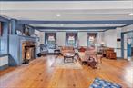 This stunning 1.09-acre property offers seclusion and tranquility, making it an ideal retreat for your extended family. The exquisite five-bedroom colonial, constructed circa 1875, beautifully blends historical charm with modern luxury. Its unique architectural style features elegant wide-plank flooring, charming bay windows, and three inviting fireplaces. The spacious kitchen is equipped with a double sink and a large island for extra seating, perfect for family gatherings. With two staircases, a luxurious pedestal tub, recessed lighting, and ornate moldings, each room has its own distinct character. The home was thoughtfully expanded in 1989 to include an addition and a two-car garage, ensuring ample space for everyone. The large driveway provides convenience and welcomes guests. Itâ€™s the perfect place for memories to be made! All Furniture (Antique) will be sold separately for $49, 000