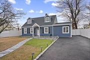 STUNNINGLY renovated 4-bedroom Expanded Cape featuring 2 full baths and top-to-bottom upgrades. This diamond-condition home boasts a brand-new roof, siding, windows, and a beautifully designed Eat-In Kitchen and bathrooms. The Jack and Jill master bath includes a double sink and a high-tech Bluetooth Alexa Wi-Fi exhaust fan. Enjoy a spacious living room, Cambridge paving stones in both the front and back yards, and a newly paved driveway, all enclosed by elegant PVC fencing. Energy-efficient heating and cooling units provide comfort year-round (25, 000 BTU downstairs, 9, 000 BTU upstairs). Located in a beautiful neighborhood, within walking distance to Division High School and Middle...This home is a must-see!