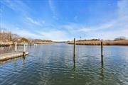 Calling all boaters! Immaculate waterfront home, just outside of the vibrant Village of Patchogue is this sprawling ranch on a quiet dead end street overlooking Swan River. Offering 75&rsquo; bulkhead, 2 docks and 4 boat slips, and just a short boat ride to Patchogue Bay and Fire island. Enjoy water front living with easy access to all water craft activities: from kayaks to canoes, and stand up paddle boards to motorboats! The picturesque setting is visible from either the relaxing expansive deck or inside the home through all the large windows. Inside, the generous sized rooms are quite impressive. The large foyer welcomes you into the bright and opened living room with fireplace and water views. The adjacent spacious kitchen offers counter seating and even more views. The primary suite has a WIC and private full bathroom. A second bedroom is en suite with private bath. The 3rd bedroom, powder room and access to attached garage complete this level. The basement is a large dry space with laundry area, walk in cedar lined closet, powder room, utilities and recreation area. Exempt from flood insurance and not in a flood zone. Don&rsquo;t miss this opportunity.