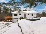 No need to check mountain conditions online - just step out onto the back deck and see for yourself! This two bedroom mid-century ranch is conveniently located within sight of Windham Mountain and just down the road from the bustling Village of Windham. The home features expansive mountain views as well as a large yard surrounded by mature trees. The 3.5 acre property insures privacy year round. Outdoor entertaining is encouraged via the large rear deck and the stone patio with fire pit. The updated interior emanates mountain cabin vibes with hardwood floors and knotty pine siding. Stay warm on those snowy days beside a crackling fire in the field stone fireplace. Spacious bedrooms and a bathroom with clawfoot tub complete cozy interior. The property also features a finished tiny house that can serve as a private office, studio or extra bedroom. The full basement includes garage space for one vehicle, a half bath, cedar closets and plenty of useable space. The property is currently used as a short term rental and can be purchased fully furnished. Head to the mountain today!