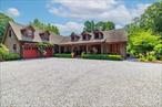 Wonderful price improvement! Experience all that the North Fork has to offer at this spectacular private compound on 4.72 acres surrounded by 300 acres of untouchable Laurel Lake Preserve. Drive past the picturesque vineyards and farm stands and turn onto a private road that leads you to the home you have been waiting for! Custom built to the most demanding standards in 2007 and completely renovated in 2018, this gorgeous cedar shake home will take your breath away! With 6 bedrooms and 6.5 baths, this one-of-a-kind property has everything you could dream of. From the welcoming front porch, the stunning entryway leads to a fabulous great room with wood-burning fireplace, formal dining room and custom eat-in kitchen with a large butlerâ€™s pantry. First floor also features a living room with wood-burning fireplace, beautiful sunroom, large primary bedroom with en-suite and walk-in closet plus three additional bedrooms, two full hall baths, a powder room, laundry and an outdoor deck that overlooks the unbelievable property. The lower level is an entertainerâ€™s paradise and has to be seen to be believed! Great room/playroom with fireplace, a fantastic 2250 bottle climate-controlled wine cellar, custom bar, state-of-the-art media room for film buffs, complete home gym, full bathâ€¦the list goes on. Outside, a private oasis awaits with an award-winning saltwater pool with waterfall, huge patio and bar for entertaining and a wonderful pool house with full bath and room for guests. There is a beautiful garden, private pond and acres of natural landscape to enjoy. Come make this your private escapeâ€¦you will never want to leave!