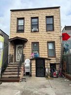 Prime Williamsburg two-family home featuring a 2-bed, 1-bath unit over a 3-bed, 1-bath unit. The basement includes two additional rooms, a full bath, an ESO, plus an extra kitchen and dining/living room on the first floor with a separate entrance. A spacious front yard offers parking for up to four trucks. The entire building consists of six bedrooms and three bathrooms, making it ideal for investment or personal use. Delivered vacant, this property is conveniently located near the bus and highway. Option to purchase with the neighboring warehouse for a combined lot size of 75x103â€”for a package deal, an excellent opportunity for expansion or investment.