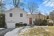 Welcome to this graceful split-level home featuring 3 bedrooms and 2 baths on a serene half-acre of property close to downtown Chappaqua. The exterior boasts a large circular driveway, stone front walkway, back patio, and beautifully maintained mature shrubs, trees and flower gardens. As you step inside you will find hardwood oak floors and crown molding adding warmth and elegance throughout. The main level offers an open floor plan, perfect for modern living. The living room, with its&rsquo; triple window, flows seamlessly into the dining room. The family room, added in 2002, is the highlight of this home with its cathedral ceiling, skylights, gas fireplace with marble surround, large arched window, and sliding glass door leading to the patio. The eat-in kitchen features wood cabinets, tile floor and backsplash, and a convenient breakfast counter. Upstairs, the primary bedroom impresses with a cathedral ceiling, triple window, wall-to-wall carpet over hardwood floors, and a double organized closet. Two additional bedrooms and a hall bath complete this level. The lower level includes a cozy den, laundry area, full bath with shower, and access to the garage. This home is located near shopping, farmers market, park, library, and the train to NYC, making it an ideal choice for those seeking comfort and convenience.