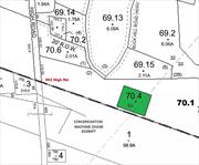 1 acre parcel for sale with driveway. Call today!