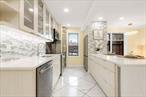 Luxury Sponsor Unit â€“ No Board Approval Required! New Construction- Fully Gut Renovated 1 Bedroom at The Dorian in Forest HillsWelcome to Residence 1C at The Dorian, a rare sponsor unit that requires no board approvalâ€”a seamless and hassle-free buying experience! This gut renovated 1 bedroom has been meticulously designed to maximize space, functionality and modern elegance. Bathed in southern exposure, this bright and airy unit offers picturesque garden views through brand-new windows, flooding the space with natural light. The heart of this home is its chef inspired kitchen, featuring natural light cabinets, quartz countertops and a stylish waterfall peninsula that doubles as a breakfast bar. Optimized for efficiency, the kitchen features top-of-the-line stainless steel appliances, an 8-bottle wine fridge, and thoughtfully integrated storage, making meal prep effortless. The open and airy living room is designed for both comfort and functionality, featuring custom built-in storage to keep your space organized without sacrificing style. Solid maple hardwood floors add warmth and sophistication throughout, complemented by sleek custom radiator covers for a polished finish. The thoughtful layout even includes a dedicated work from home space, making remote work both comfortable and efficient. Your king-sized bedroom offers two deep closets for ample storage. The spa-like luxurious bathroom is a standout feature, showcasing a rare double-sink vanity with matte black hardware, a rainfall showerhead, and sleek porcelain tilesâ€”seamlessly combining elegance and practicality.The Dorian is situated in one of the most desirable locations in Forest Hills. Well maintained, financially strong coop with maintenance of $921.40/month. One of the few pet friendly coops in the neighborhood. Residents enjoy the convenience of a live in super, laundry & indoor garage. A modern virtual doorman system, provides security in this small boutique building. Located in the heart of Forest Hills with easy access to shopping, dining, express subways, and Austin Streetâ€™s vibrant scene. This is a rare opportunity to own a turnkey home with no board approval requiredâ€”move in hassle-free and start enjoying luxury living immediately!