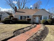 Nice cape on a wide, quiet street with a large open yard, one car garage connected by breezeway. Driveway can accommodate 4+ vehicles. Easy walk to downtown Sayville Village and LIRR. Covered rear deck.