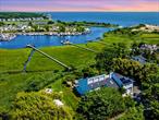 Welcome To This Waterfront, Stunning Contemporary Home With 5 Boat Slips And Easy Access To The Great South Bay. This Luxurious Living Space Spans Over 3, 000 Square Feet And Features Breathtaking Views, Modern Updates, And Picturesque Lighting. As You Enter The Two-Story Foyer, You Are Greeted With Modern Details Throughout. The First Floor Includes A Spacious Den Leading To 3 Bedrooms And A Beautifully Remodeled Full Bath. A Sunroom Allows For Indoor Enjoyment With A Full View Of The Pool Area, Making It A Perfect Gym Or Sitting Room To Relax. Upstairs, You&rsquo;ll Find A Breathtaking Open Great Room With Picturesque Views Through The Floor-To-Ceiling Sliders Of The Water/Canal. Absolutely Breathtaking! The Magnificent Gourmet Kitchen Features Skylights, Stainless Steel Appliances, And A Large Breakfast Bar-Perfect For Entertaining. The Elegant Main Bedroom Includes A Loft Office With Water Views, A Private Balcony Overlooking The Grounds, A Spa-Like New Bathroom With Steam Shower and Smart Toilet, And A Walk-In Closet, Adding A Level Of Sophistication. The Amazing Outdoor Living Space Includes A 20X40 Gunite In-Ground Pool, An Outdoor Full Bathroom, Wraparound Decks With A Hot Tub, And Expansive Multi-Level Decks All With Views Of The Water And Private Sanctuary. Along The Yard, There Is A Cozy Fire Pit Area, A Beautiful Vine-Covered Pergola, And An Outdoor Kitchen Area. A Scenic 400-Foot Walkway Leads You To A Private Dock With Electricity And 5 Boat Slips. The Deep Canal Allows For Large Boats To Take A Ride Out For A Day At Fire Island Or A Tour Of The Great South Bay To View The Most Beautiful Sunsets. For Added Convenience And Incredible Savings, There Are Newer Solar Panels That Can Be Easily Transferred To Purchaser. This Home Is Perfect As A Vacation Home Or For Year-Round Living. Perfectly Located Between Patchogue And Bellport Villages.