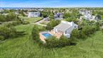 Nestled south of the highway overlooking a picturesque estuary in one of Westhampton Beach&rsquo;s most sought-after areas. With panoramic views and brilliant sunshine, this beach home offers a peaceful escape living within nature. Just moments to the Village&rsquo;s boutique shops, restaurants and private beach. Currently stands a 4 bed, 3 bath contemporary with vaulted great room flooded with natural light designed for indoor/outdoor living. An expansive south facing deck with heated pool, outdoor shower and Dimension One spa. This exceptional property also has DEC approval and permits for a new 3, 600 sq. ft. modern build with five bedrooms and a heated gunite pool. Whether you choose to enjoy the home as it is today, renovate or build your dream retreat, this prime location provides effortless access to all the area has to offer. It&rsquo;s time to make 16 Meadow Lane your own.