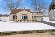 Beautifully Renovated Cape Cod with Modern Upgrades!Step into this stunningly updated Cape Cod, where charm meets contemporary style. A brand-new blacktop driveway and elegant paver walkway lead you to the front door of this nearly fully renovated home with the architectural roof, and new/updated windows, and brand new vinyl siding. Inside, the expanded kitchen shines with new Samsung stainless steel appliances, granite countertop, stylish oak laminate flooring, recessed lighting, and a spacious bay window that fills the space with natural light. The laundry is easily accessible with full size stackable brand new GE appliances!Throughout the home, fresh modern colors, crisp white moldings, and a newly tiled full bath create an inviting atmosphere. The upper-level bedrooms boast exquisite solid oak flooring, complemented by newly installed stair treads and a sleek modern banister.Enjoy outdoor living in the beautifully fenced backyard with a patioâ€”perfect for relaxing or entertaining. Plus, take advantage of the oversized 1.5-car garage, offering ample storage and convenience.This move-in-ready gem is a must-see! Schedule your showing today!