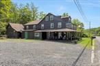The Mountain Brook Inn in Shandaken, NY, presents a unique commercial opportunity in the hospitality sector. This historic property, originally built in 1805 and extensively renovated to reopen in 2025, offers a perfect blend of rustic charm and modern amenities. Situated on a picturesque 1-acre lot along Bushnellsville Creek, the 7, 863 square foot inn features 7 guest rooms on the second floor, with 5 additional rooms with potential for renovation on the third floor. The property boasts a rich history, having served as a stagecoach station, post office, country store, tavern, and public meeting house. Recently renovated while preserving its rustic elements, the inn now features modernized amenities including new bathrooms, a chef&rsquo;s design kitchen with all new equipment and pizza oven, new on-demand hot water system, new artesian well, a large attached barn and updated heating systems. This property also has a new state-of-the-art septic system designed and installed by the DEP. The property is fully licensed to operate as a hotel, restaurant, tavern, and package store, making it a turnkey business opportunity. Currently open and fully operational as a Hotel, Food Service and full-service Liquor license in place and active. Located in the NY City Watershed protected area, where new lodging and food businesses are difficult to establish, this property represents a rare find. This historic retreat exudes elegance and authenticity, with every detailâ€”from handcrafted furnishings to meticulously preserved architectureâ€”staying true to the historic nature of the Inn. This is a true authentic Catskill experience for guests to enjoy, while staying close to all that this area has to offer from skiing to hiking and so much more!Present owners have purchased a large resort in the same area. Sale can be combined with full service restaurant at 7159 State Route 28, Shandaken NY 12480 (MLS# 823739) at a discount which will give new owners a major stake in the area.