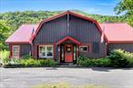 Discover a rare, turnkey restaurant opportunity in the heart of the Catskills. This prime propertyâ€”formerly home to J Roccos Creekside Grill and Esopus Creek Cigarsâ€”is now available as the current owners are relocating their operations to a new resort nearby. Set along one of the busiest roads in the region, this well-established restaurant enjoys a stunning, creekside location on the banks of Esopus Creek. With a legacy dating back to the 1930s, it stands as one of the longest-running and most popular dining destinations on Route 28. The siteâ€™s enduring success and high visibility make it a magnet for both locals and tourists. The property offers strong income potential, with rental values of $6, 000 per month for the restaurant and $1, 500 per month for the cigar lounge. The rustic log cabin building includes a spacious dining room, fully equipped bar, commercial kitchen, cedar-lined walk-in, and a large outdoor deck overlooking the water. Fully operational and ready for immediate transition, the sale includes an active liquor license, current permits, and all furnishings. Its location guarantees a steady stream of customers year-round, further enhanced by amenities like a dedicated cigar lounge and a creekside seating area with serene water views. Close to attractions such as Belleayre Mountain and renowned for quality and hospitality, this turnkey offering is ready for a new owner to move in and thrive. Simply put up your sign and start welcoming guests from day one.Sale can be combined with nearby motel at 540 Rt-42, Shandaken NY 12480 (MLS # 823745) at a discount which will give new owners a major stake in the area.