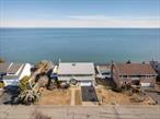 Welcome to this large colonial home, built in 1980, offering the perfect blend of modern amenities and timeless charm. Situated on an incredible property with 80 feet of private beach access, youâ€™ll enjoy breathtaking water views of the Long Island Sound from the entire back of the home and as soon as you walk in the front door! This home is tucked away quietly in the private association of Oak Neck Point. The backyard boasts a saltwater pool with a spacious patio and diving board, ideal for entertaining or relaxing. Custom woodwork, crown molding, and exquisite cabinetry are featured throughout.Step into the grand entrance with soaring 18-foot ceilings and oversized Anderson windows, skylights, and sliders that flood the space with natural light and water views. The chef-inspired kitchen is a true highlight, featuring custom wood cabinetry, a granite countertop, and an oversized island with additional storage, perfect for preparing meals and entertaining with an open concept.The lower level features a one-bedroom apartment with a full kitchen, bathroom, and private entranceâ€”ideal for guests, home office, or extended family. There is still a private finished basement on the main side of the home.The primary suite offers a private retreat with a spacious walk-in closet and custom built-in storage. The primary bathroom has been remodeled, providing a spa-like experience, while the hall bathroom on the upper level and the half bathroom on the main level have also been tastefully renovated. Hardwood floors to match are beneath all of the carpet on the second level.Oversized bedrooms provide ample space for your needs, and thoughtful storage solutions can be found throughout the home.The three-zone central air conditioning system was replaced in 2023. The oil burner was also completely replaced in recent years. Along with two sets of washer/dryersâ€”one in the basement and one on the upper level. The roof and front siding has also been replaced in recent years.Outside, the property is enhanced by state-of-the-art landscaping, accent outdoor lighting, and a fully automated in-ground sprinkler system. The home also features a 2+ car garage with interior access to both the kitchen and lower level. Come tour this Gem today!