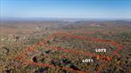 An incredible, rare opportunity in Woodstock.It has been very long time since a parcel of this magnitude has available for sale in Woodstock. This contiguous 60-acre property, consisting of two 30-acre lots, features rolling hills, stunning rock outcroppings, mountain views, and diverse mature trees, uniquely offering both beauty and potential. A privately built road, completed by the owners, leads directly to the property. The sellers are currently finishing three stunning passive homes designed by renowned passive house architect Barry Price, which they will use as their private residence. In addition to the private road, an additional access point is available on Sawkill Road. Conveniently located just seven minutes from the NYS Thruway, the property is easily accessible from NYC, NJ, and NJ, and only 1.25 hours from the George Washington Bridge. Just five minutes from Woodstockâ€™s Village Green. 15 minutes to Kingston, 20 minutes to Rhinecliff Amtrak station. The property also connects directly to the Onteora Lake Red Hiking Trail, making it an ideal retreat for nature lovers. Zoned R5, the property allows for up to 12 residential units, making it a rare and valuable investment opportunity in the Hudson Valley.
