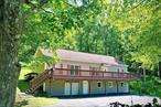 Looking for a beautifully maintained, open floor plan, contemporary home with a huge deck and a view? Well look no further folks! This Roscoe, NY (Trout Town USA) 3 bedroom, 2.5 bath house on over 4 acres is ready to go and ready for you! The quality is apparent upon first entry into the fully heated and finished cozy garage with workshop area and ample storage. Next enter into the finished lower level with ample space for billiards, gaming or perhaps a cozy den featuring a toasty pellet stove and beautifully finished oak bar. Arrival on the main level reveals an open layout bathed in natural light that is in and of itself an invitation to relax and unwind. Make your way past the kitchen peninsula and you will find ample storage space, a walk in pantry, an array of stainless steel appliances and even a lovely breakfast nook area that leads to the back deck and screened in porch! 9&rsquo; ceilings, fresh paint, tasteful fixtures and a refreshing sense of fullfilment accentuate the pride of ownership and loving care so central to making a house a home. A private primary bedroom suite just off of the Dining Room area exudes a luxurious sense of self care and convenience while the remaining bedrooms provide plenty of elbow room and glowing light to make all occupants feel special. Don&rsquo;t forget the side mudroom area, back deck, out buildings and even a back up, supplementary or your choice, a possible primary natural heat source of an outdoor wood furnace! So much to consider and yet so little to do! Walk in, sit down, chill out and let the simpler world unfold around you! Your new reality has found you and your search is over. Welcome to the Catskills!