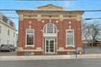Beautiful brick building stands in the center of Main Street downtown Sparkill NY. This former bank property has many versatile uses including professional office, upscale retail, restaurant and event space. Long term tenant referred. 2, 400+/-SF of retail/office space on ground floor and almost 1, 000+/-sf of basement/storage. Plenty of level lot parking. Near public transportation. CS-Community Shopping Zoning (doc in file) Insurance and RE taxes are included. Tenant is responsible for snow clearing and basic maintenance of the parking areas.Base rent of $6, 000 per month plus any increase in taxes over current year.
