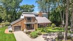 Welcome to this stunning, newly renovated contemporary home in the desirable Redwood section of Sag Harbor Village. Thoughtfully designed with modern amenities and luxurious finishes, this two-story residence offers 4 spacious bedrooms and 3.5 bathrooms, including a first-floor primary suite with a luxurious en-suite bath featuring radiant heated floors and an upstairs primary suite with a walk-in closet, balcony, and captivating water views. The elegant bathrooms showcase Waterworks fixtures and tiles, while the gourmet kitchen boasts premium appliances, marble countertops, and custom cabinetry. Enjoy year-round comfort with central A/C, a new smart heating system. The home&rsquo;s stylish exterior features cedar siding, a galvanized steel roof, all-new windows, and a beautifully landscaped blue stone backyard with an 8x40 pool, perfect for outdoor entertaining. Additional highlights include a cozy wood-burning fireplace, California closets, a tankless hot water heater, 1 car garage, town water and gas, and an irrigation system. This exceptional property perfectly blends style, comfort, and functionality, offering the best of Sag Harbor Village living.
