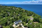 Welcome to 110 Crescent Court, a newly constructed architectural gem where luxury, craftsmanship, and modern convenience converge. Set within the exclusive Crescent on the Sound enclave, this exceptional residence offers private deeded water access and sweeping views of the Long Island Soundâ€”all just minutes from top-tier dining, golf, and year-round coastal amenities. Privately positioned behind upgraded fencing and lush, professionally landscaped grounds with irrigation, the home sits on a beautifully finished lot complete with a custom driveway and one of the finest exterior packages available on the market today. Step inside to discover interiors as refined as the setting itself. Expansive wraparound porches and a large private deck off the primary suite provide a front-row seat to the water, while oversized 9-foot sliding glass doors open directly to the approved site of an oversized gunite poolâ€”designed to elevate your outdoor living experience and ready for construction. Inside, the home showcases six-inch-wide rift and quartered white oak floors throughout, setting the tone for understated sophistication. The chefâ€™s kitchen is a true showpiece, boasting handcrafted white oak cabinetry inside and out, bold dark granite countertops, and high-performance Thermador appliances.Each of the homeâ€™s bedroomsâ€”including the water-facing primary suiteâ€”features breathtaking views of the Long Island Sound, while spa-inspired bathrooms are enhanced by elegant oak vanities and curated designer lighting. The custom-built primary closet blends elegance with practical functionality.Completing this exceptional offering is a spacious three-car garage outfitted with advanced LiftMaster side-mount openers, ensuring quiet, seamless operation.From its premier finishesâ€”among the best available on the market todayâ€”to its approved pool plan, water access, and unmatched privacy, 110 Crescent Court is a rare opportunity to own a coastal sanctuary in one of Long Islandâ€™s most prestigious neighborhoods.