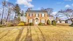 This Brick home is filled with charm on a large property, offering an unbeatable convenient walkable location near restaurants and shopping, beach, public school, and transportation.  A classic formal entry leads to the dining and living rooms featuring a double sided fireplace onto the heated sunroom. The large kitchen adjoins a second heated sunroom. There are 3 bedrooms and 2 full bathrooms. A full unfinished basement and walk up attic provide ample storage.