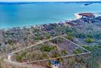 Extremely rare offering of 5.25 acres of undeveloped, wooded land in bucolic Paradise Point - the crown jewel of the charming hamlet of Southold. Once an equestrian grazing meadow to an adjoining 33 acre estate, this land offers a scenic, tranquil, secluded location close to gorgeous Bay beaches. Borders preserved land.Just a few miles to fine dining and cafes, tasting rooms & vineyards, boutique shopping, galleries, golfing, marinas and more.A once in a lifetime opportunity to build your dream home, compound, equestrian facility, your personal vineyard - all with the utmost privacy in this amazing piece of paradise. Potential for 2 acre subdivision.