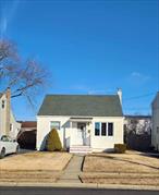 This charming Cape Cod single family home features 4 bedrooms and 1 full bath with very low taxes. The first floor includes 2 bedrooms, full bath, eat in kitchen and living room, providing a cozy and inviting atmosphere. Second floor offers two good size bedrooms. Home offers gas cooking and oil heating. Bilco door to the crawl basement. Located in Lindenhurst with Copiague Schools and not in a flood zone. Spacious backyard with beautiful covered patio for fun-filled summer days. A must see will not last!