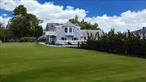 On the fringe of the Hamptons, this bayfront home was built in 2003 and boasts 3, 800 sq.ft. With three bathrooms, five bedrooms, two stories, and a lot size of 1.04 acres, this property offers plenty of room for those who love to entertain. The home exudes a timeless appeal with its classic Hampton beach house design, which has been fully gutted and renovated in 2017 and 2019. Don&rsquo;t miss out on the opportunity to make this gem your own! Experience the bayfront style of living in the home with breathtaking, unobstructed water views of the bay. From the front entrance to every room, you&rsquo;ll be greeted by the serene beauty and sunsets of the bay. This fully bulkheaded and fenced property, with private stairs to the beachfront and a private sidewalk, offers a stunning one-acre backyard encircled by a tumbled huge patio, creating a perfect outdoor retreat. Renovated inside and out in 2017, this paradise has hardwood floors and Calcutta marble everywhere throughout and includes an attached garage. Upon entering, you&rsquo;ll be welcomed by the bayfront water views from the bay from the entry foyer, which leads into the living room with 2 masonry fireplaces. The open kitchen boasts custom butcher block counters, high-end stainless steel appliances, and a center island. The dining area features two sets of glass French doors, which give access to a second dining room/sunroom with a private custom bar that brings in the outdoors; the pantry room offers garage access, a back door, and a convenient guest bathroom/private studio. A blend of tradition and modern style, Hampton classic design, the staircase leads to the second level where you&rsquo;ll find a master suite of 800 sq ft and 700 sq ft marbled bathroom, then a walk-in closet, and then a bonus room. The primary ensuite features a large glass French door opening with a balcony and a stunning view to a mahogany deck, perfect for lounging and enjoying the beautiful yard and bay views.