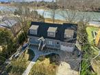 Welcome to 2280 Deep Hole Drive, a boaterâ€™s paradise, 2-story, 3, 000 sq ft low-maintenance retreat home built in 2022. This home boasts 9â€™ ceilings on the main level, and 3 spacious bedrooms, chefâ€™s kitchen, with top-of-the-line kitchen appliances, and a professional grade stovetop, including a first-floor primary ensuite, along with 2 full bathrooms and a half bath for your convenience, as well as workstation areas. The property&rsquo;s unique attributes include a music room for the artistically inclined, a full walk-out basement offering expansive storage, room for a workout area or workshop possibilities. Step outside onto a serene back deck overlooking 130 feet of deep water frontage on Deep Hole Creek, with direct access to Peconic Bay. A dock that can accommodate two boats up to 36â€™ each, and is equipped with water and electric and stands ready for your boating adventures. Nestled in the welcoming community of Mattituck, NY, you&rsquo;ll find local amenities to suit a range of interests, from exploring local wineries, parks and shopping on Love Lane (less than one mile away), to enjoying the nearby beaches, this location offers a vibrant lifestyle for all. Experience the blend of comfort, beauty, and convenience at 2280 Deep Hole Drive, where your new chapter awaits. For added peace of mind, a whole-house Generac generator is included.