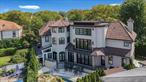 WELCOME TO THIS PRISTINE ESTATE nestled on 97 x 158 grounds and experience a lifestyle of unparalleled luxury! Upon entering you will be delighted with volume ceilings, custom windows and doors that set the tone for luxurious ambience. This home spans 142 by 80 foot deep offering ample space for a life of comfort and elegance. Custom mill work and molding underscore the attention to detail and craftmanship. The main floor boasts a custom kitchen, Dining Room, Formal Living Room with fireplace and a family room. The second floor boasts 4 suites with designer tile and custom cabinetry. The Primary suite combines spa tranquility and architectural elegance while the lower level is designed for leisure and entertainment featuring a media room, fitness center, game room and maid&rsquo;s quarters. The outdoor area is equally impressive featuring year round heated swimming pool with waterfall sauna and steam room.
